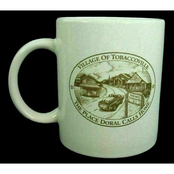 Village of Tobaccoville The Place Doral Calls Home Coffee Cup Mug Cigarettes Vtg - Picture 1 of 4